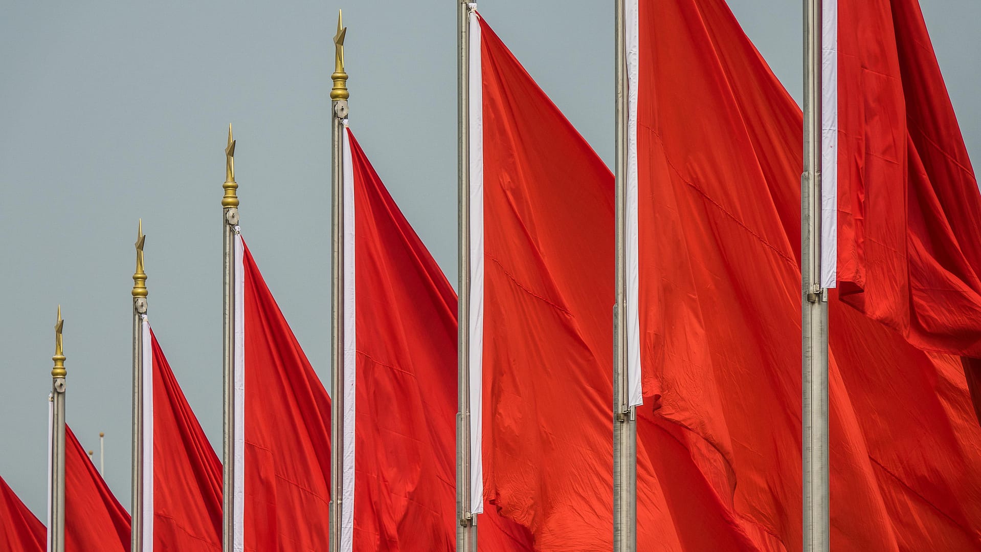 red flags in prompts -- a photo of red flags on flagpoles