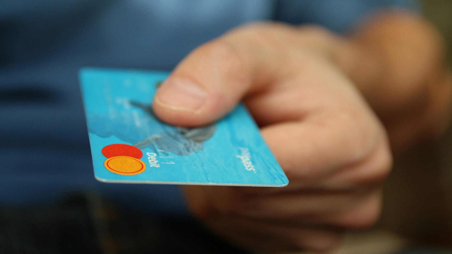 ai safety tool buyers guide -- a person holding a debit card